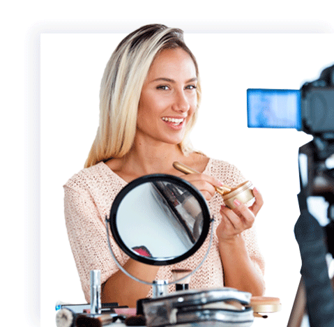 person applying make up on camera